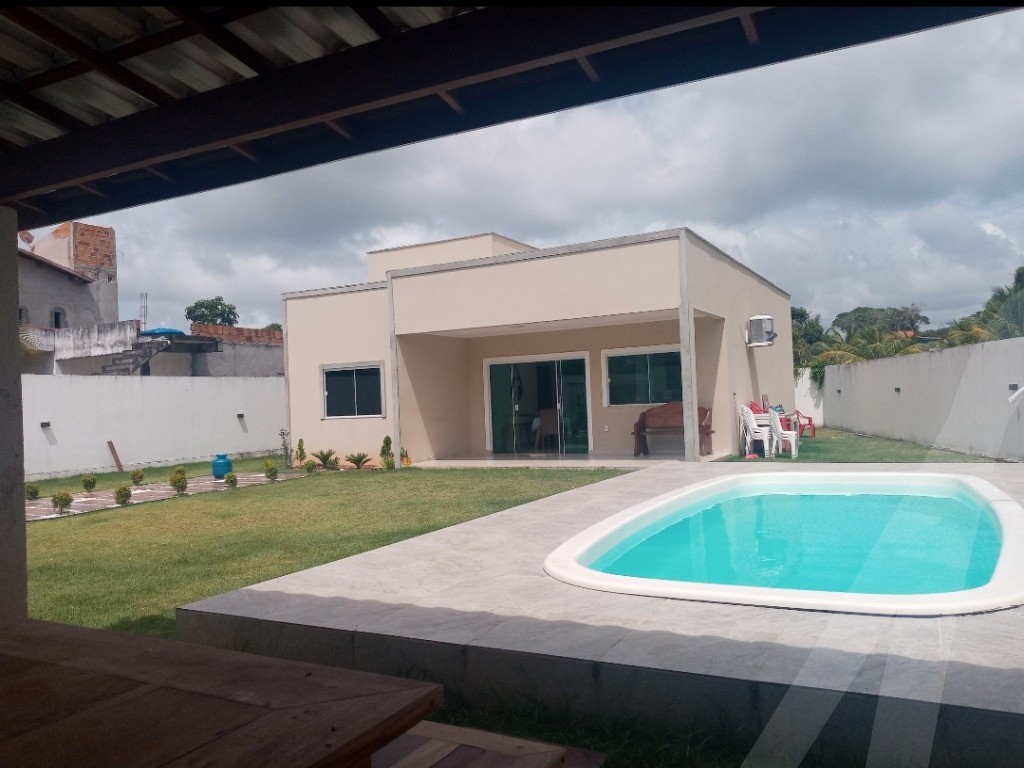 Casa para venda em condomínio na Linha verde no loteamento Sol nascente com  3 quartos com suíte piscina área verde mudada em Jacuípe